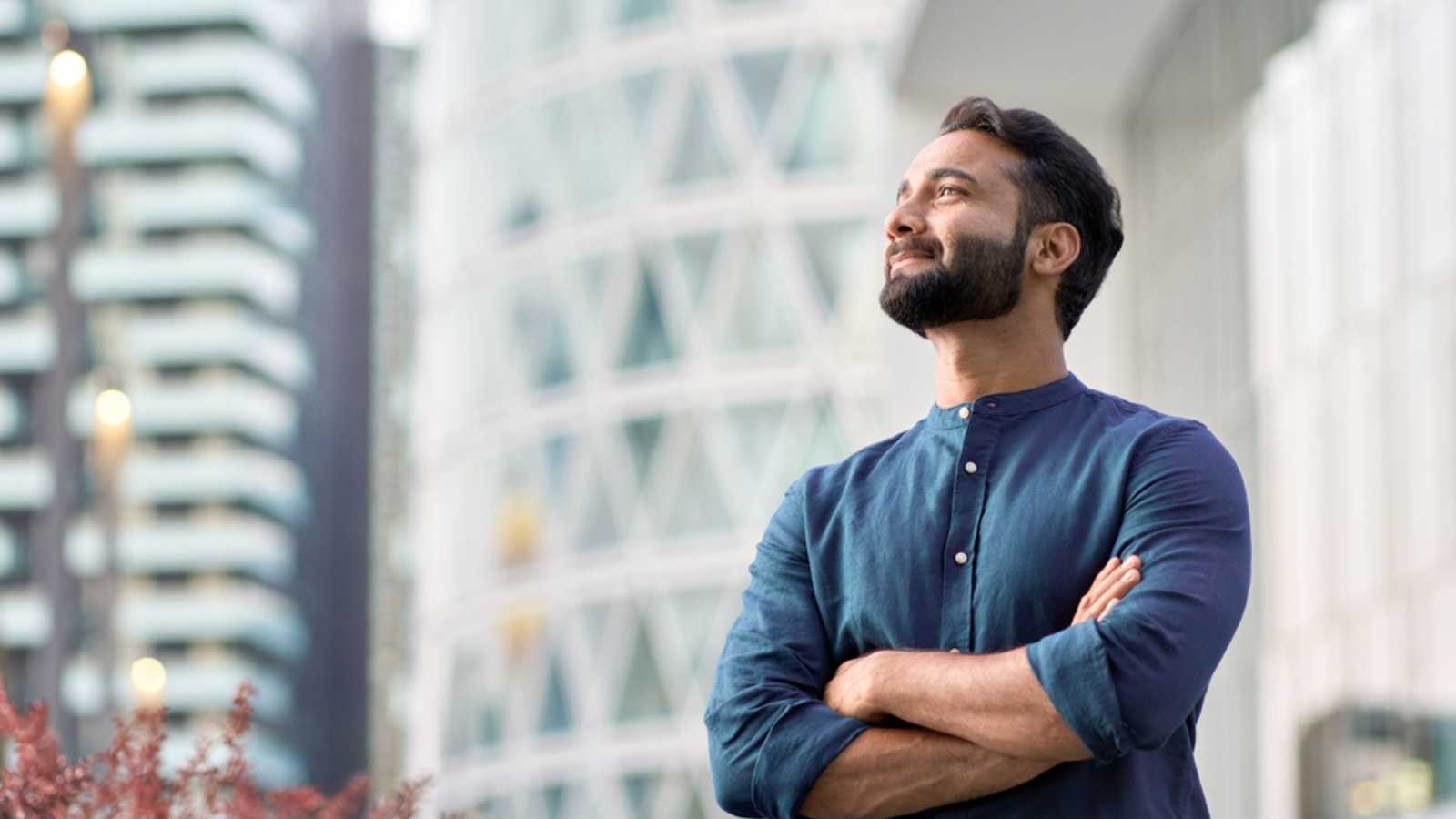 10 Secrets To Negotiating a Higher Salary Confident happy man