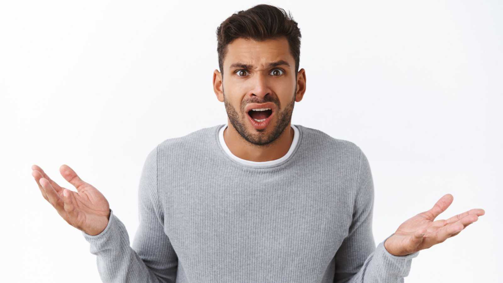 10 Secrets To Negotiating a Higher Salary Man shrugging shocked and confused