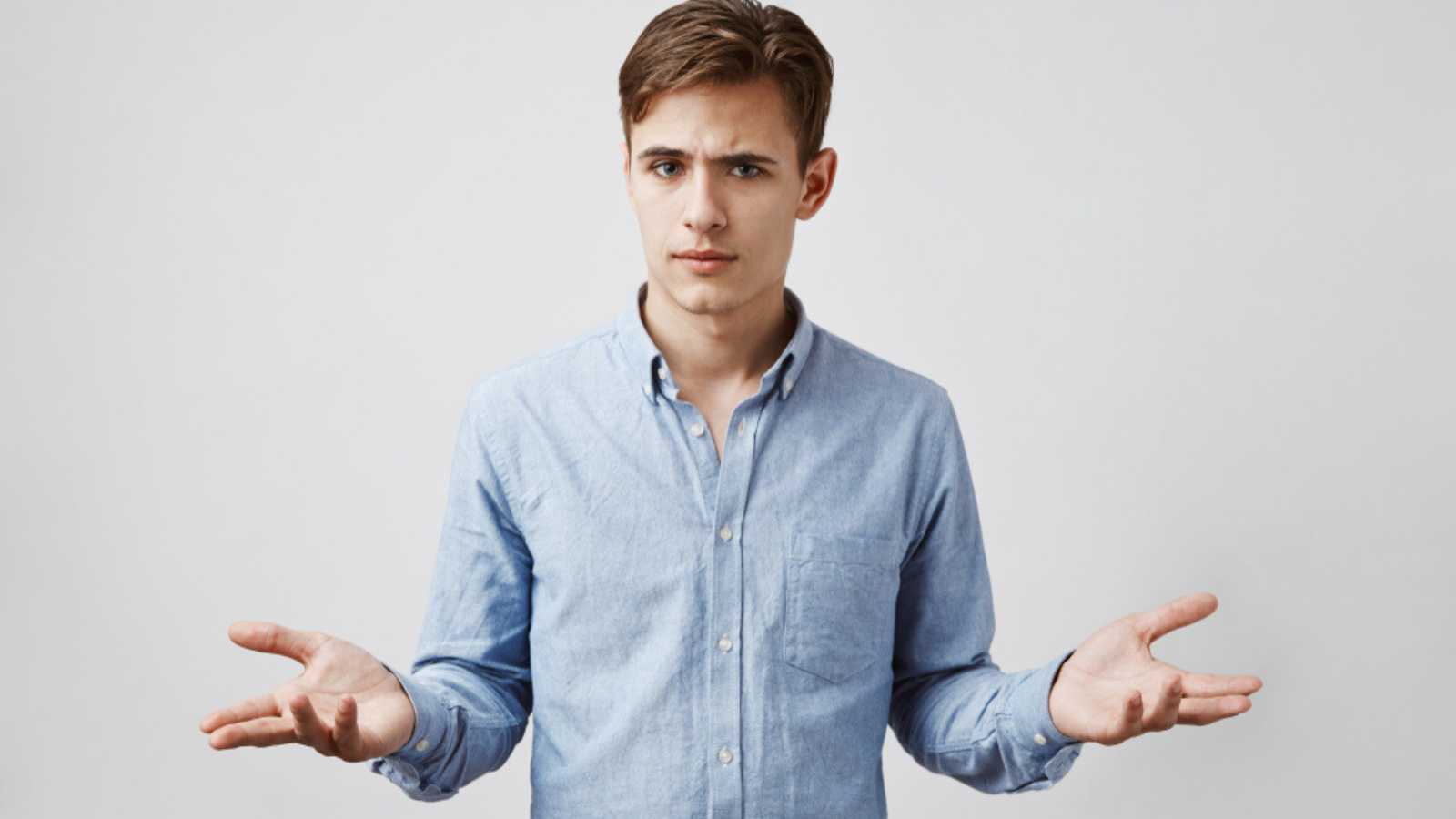 10 Secrets To Negotiating a Higher Salary Man shrugging